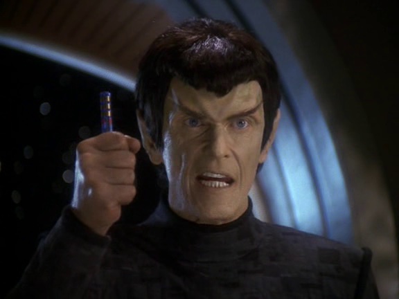 Romulan Senator Vreenak confronts Sisko about his deception
