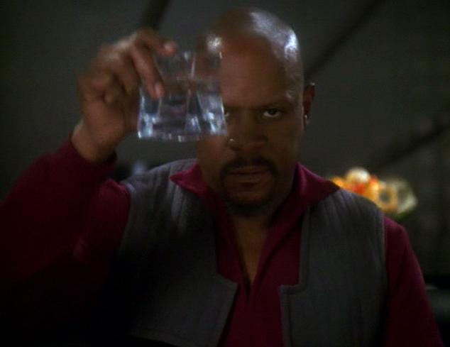 Captain Sisko, resigned, offers a toast to the ‘good guys‘