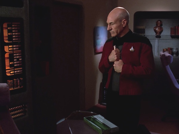 Picard with the Ressikan flute, back on board the Enterprise